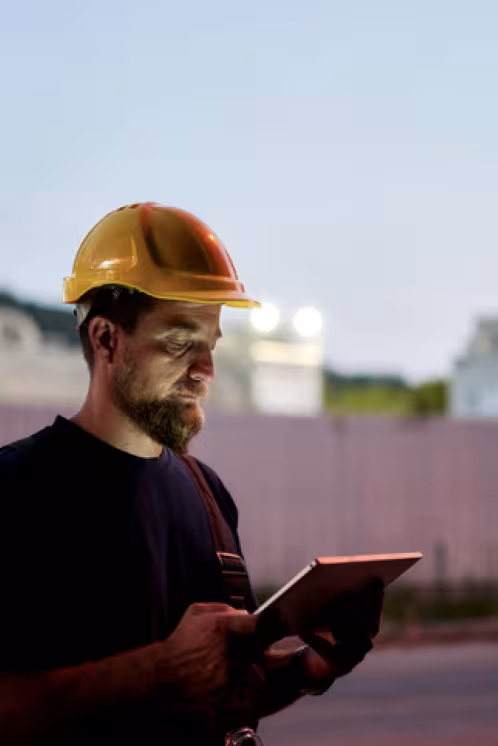Construction worker on tablet