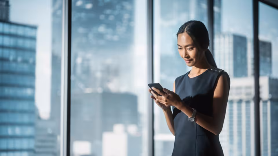 Woman on phone in a high rise